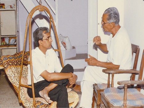 Guruji teaching to Mr.Ashok Sanghavi